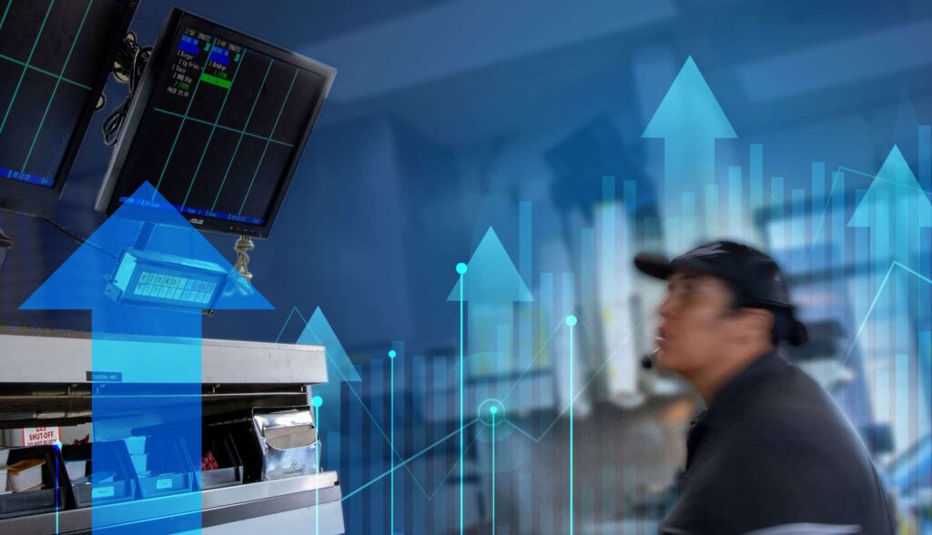 CA QSR Minimum Wage Increase blog image showing staff watching the menu board and arrows indicating the minimum wage increase.