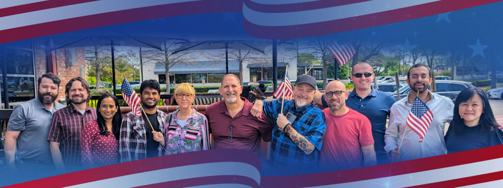 Presto employees in a row holding American flags and celebrating 100 days to the 250th birthday of America.
